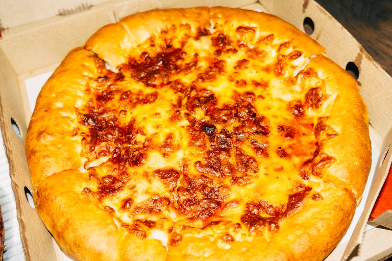 Four Cheese Pizza with premium blend of cheeses